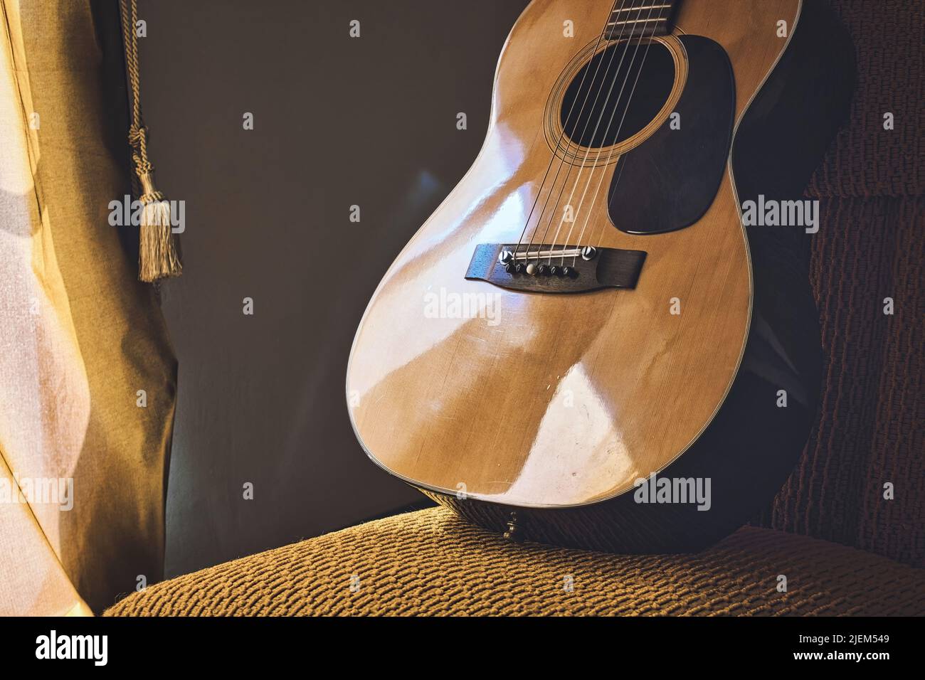 A Spanish acoustic classical guitar with steel and nylon strings