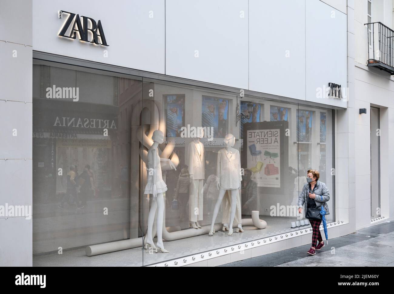 Madrid, Spain. 23rd Apr, 2022. A pedestrian walks past the Spanish  multinational clothing design retail company by Inditex, Zara, a store in  Spain. (Credit Image: © Xavi LopezSOPA Images via ZUMA Press