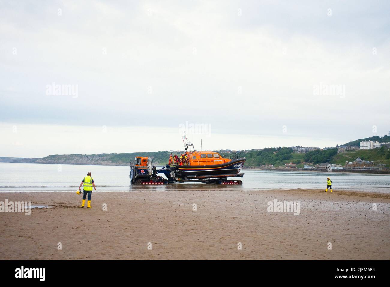 The Scarborough lifeboat being towed back into the lifeboat station after a Tuesday evening practice session Stock Photo