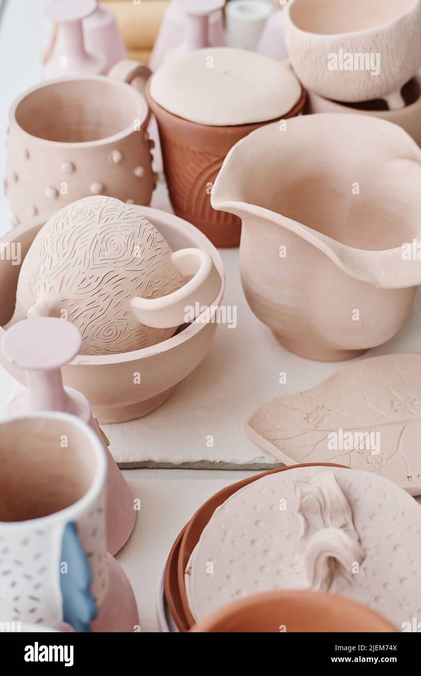 Assortment of handmade earthenware such as bowls, cups, mugs, jugs, pots and other kinds of clay