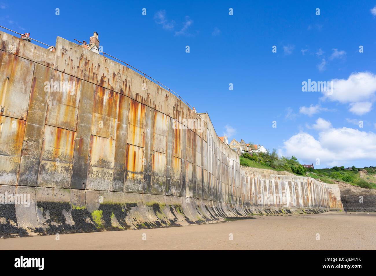 Robin Hood's Bay Yorkshire village protected by a high seawall sea wall