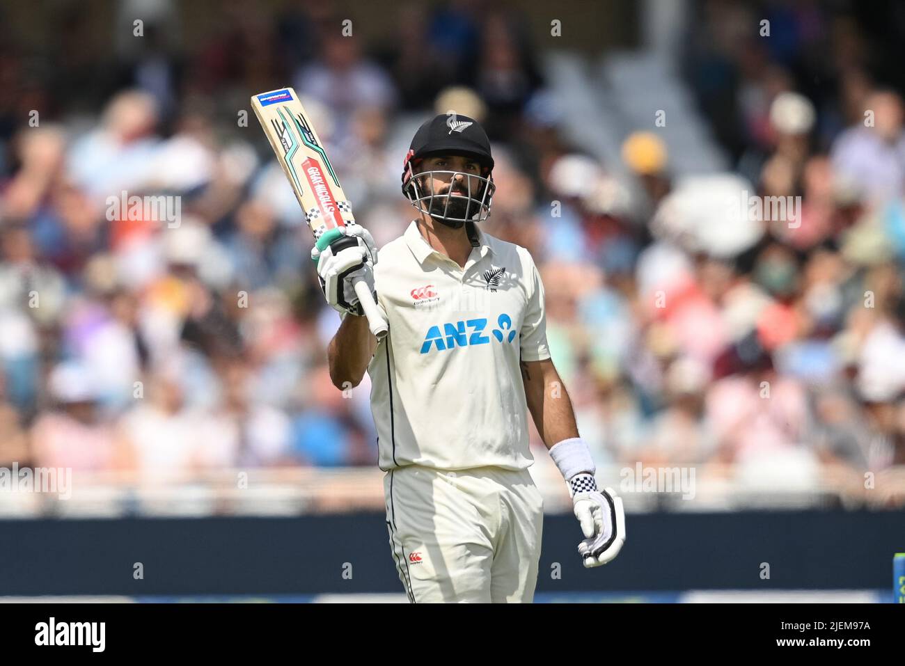Daryl Mitchell of New Zealand celibates hitting 150 runs during day 2 of the 2nd Test between the New Zealand Blackcaps and England at Trent Bridge Cricket Ground, Nottingham, England on Saturday 11 June 2022. Stock Photo