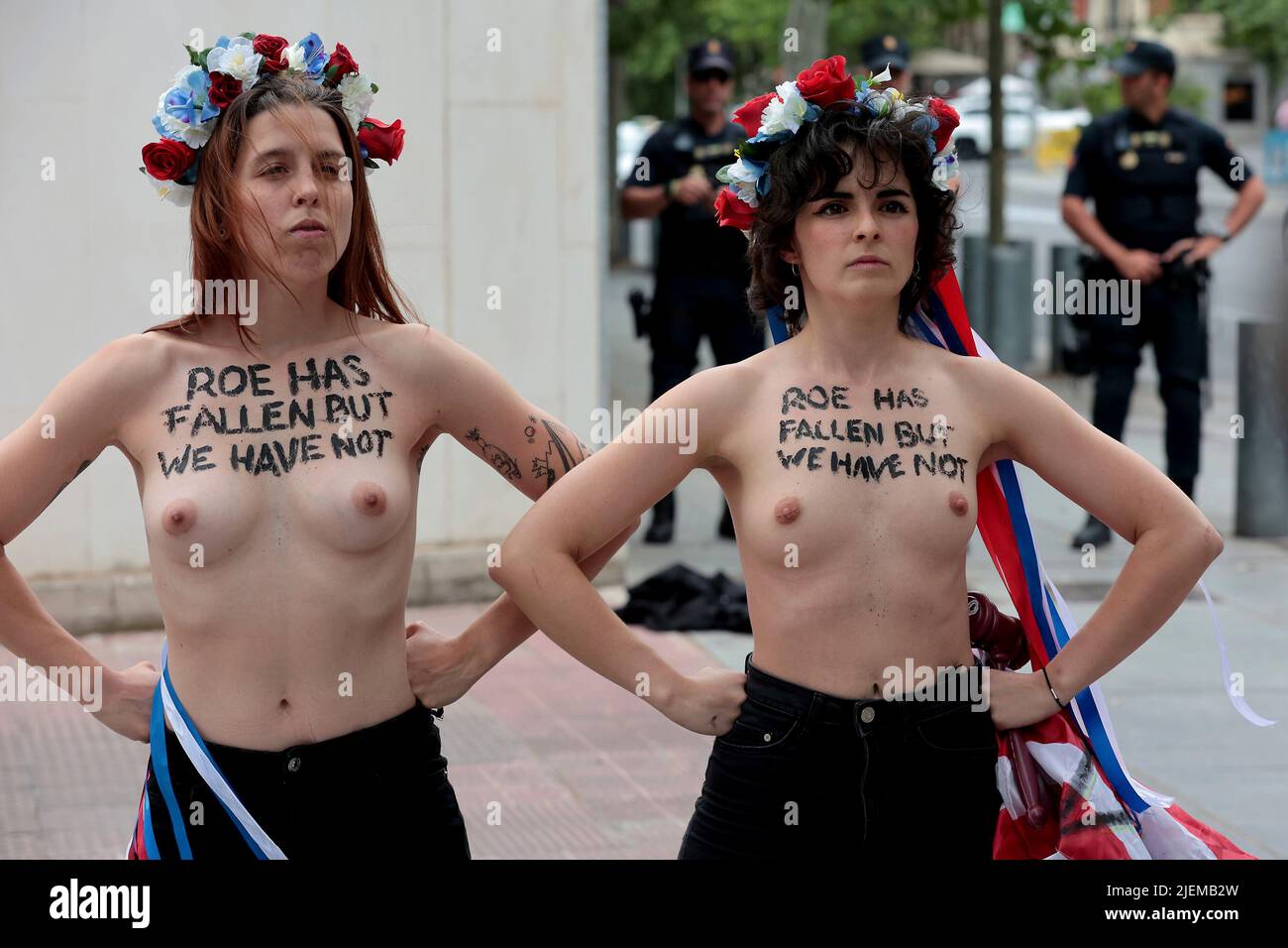 Madrid, Spai; 27.06.2022.- Activists from Femen España protest in front of the Embassy of the United States of America at Madrid in favor of abortion and against the decision made by the Supreme Court with the votes of conservative judges that there is no constitutional right to abortion, allowing it or not. termination of pregnancy states. Photo: Juan Carlos Rojas Stock Photo