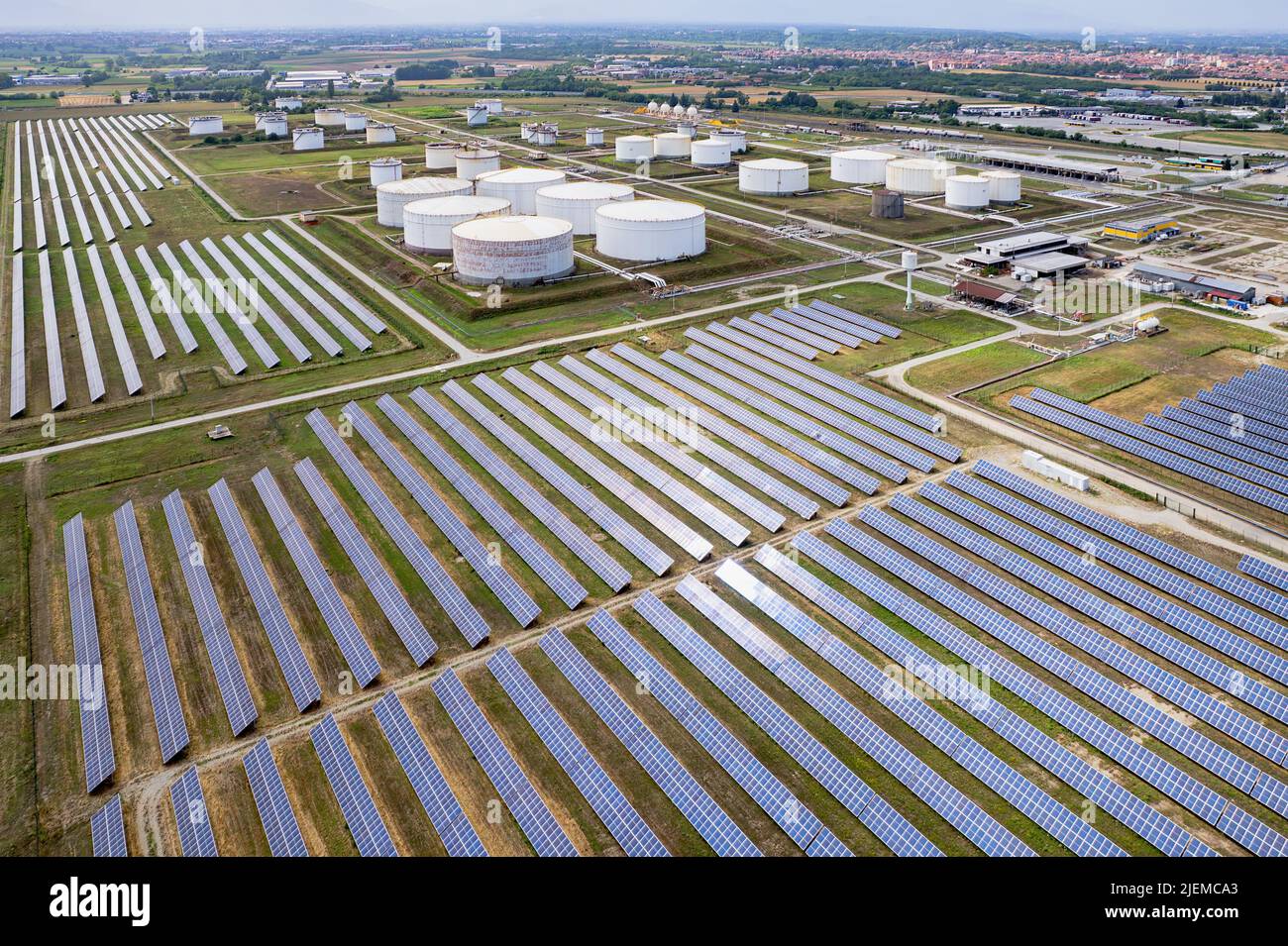 Fuel storage tank and solar farm from above. Gas and diesel reserve for