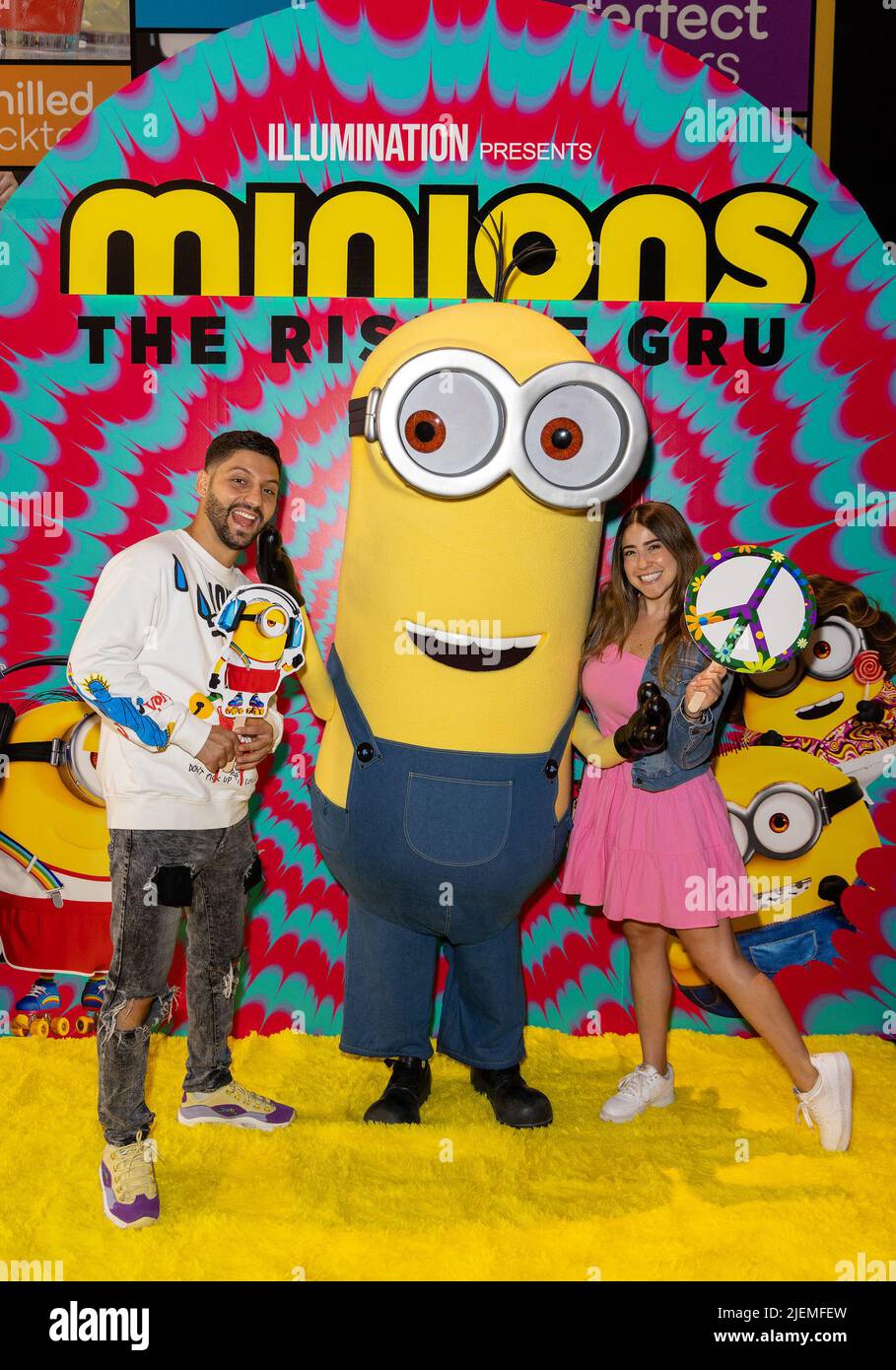 Miami, United States Of America. 25th June, 2022. MIAMI, FL-JUNE 25: Abelardo Chahwan, Kevin the Minion and Guest are seen during the Telemundo Talent screening at AMC Sunset Place 24 in Miami, Florida on June 25, 2022. (Photo by Alberto E. Tamargo/Sipa USA) Credit: Sipa USA/Alamy Live News Stock Photo