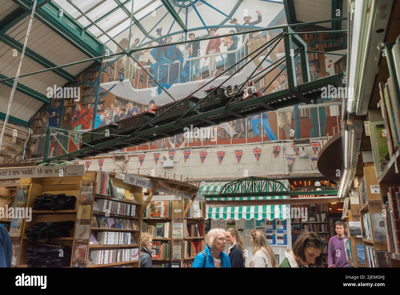 UK bookshop, view inside the famous Barter Books book shop in Alnwick with its working overhead model railway, Northumberland, England, UK Stock Photo