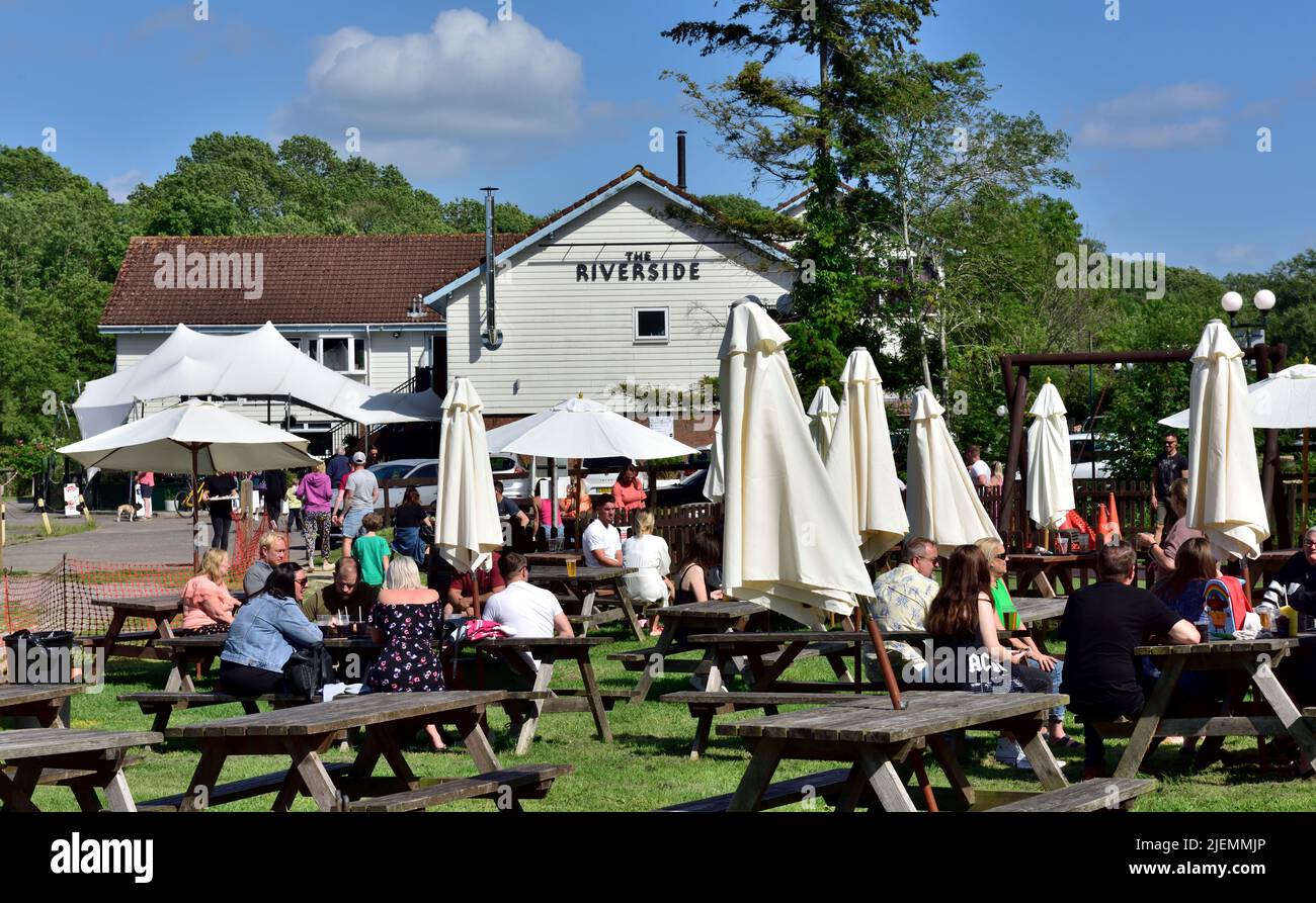 Some of outdoor seating area of The Riverside Inn and restaurant by River Avon, Saltford, UK Stock Photo