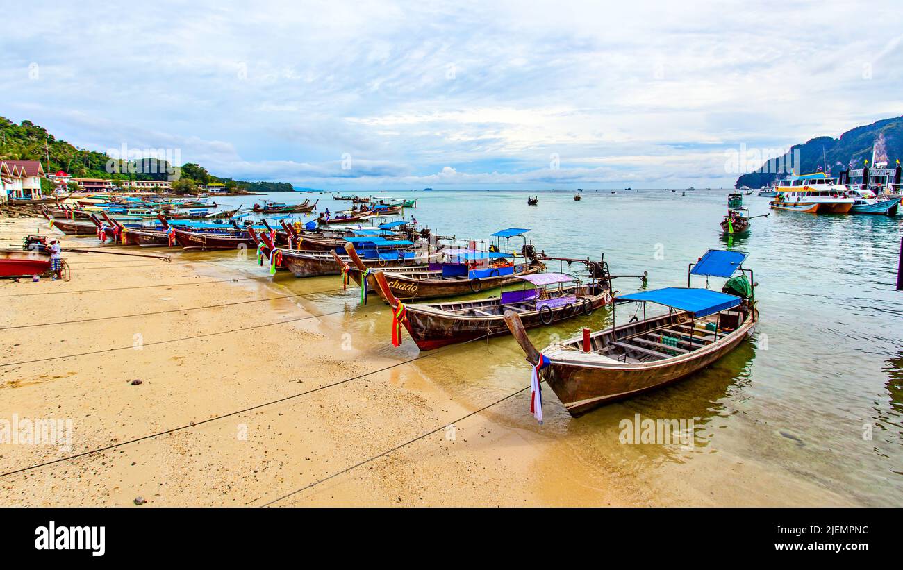 Phi Phi Island, Thailand - December 18, 2010: Boats on the beach in Phi Phi Island Stock Photo