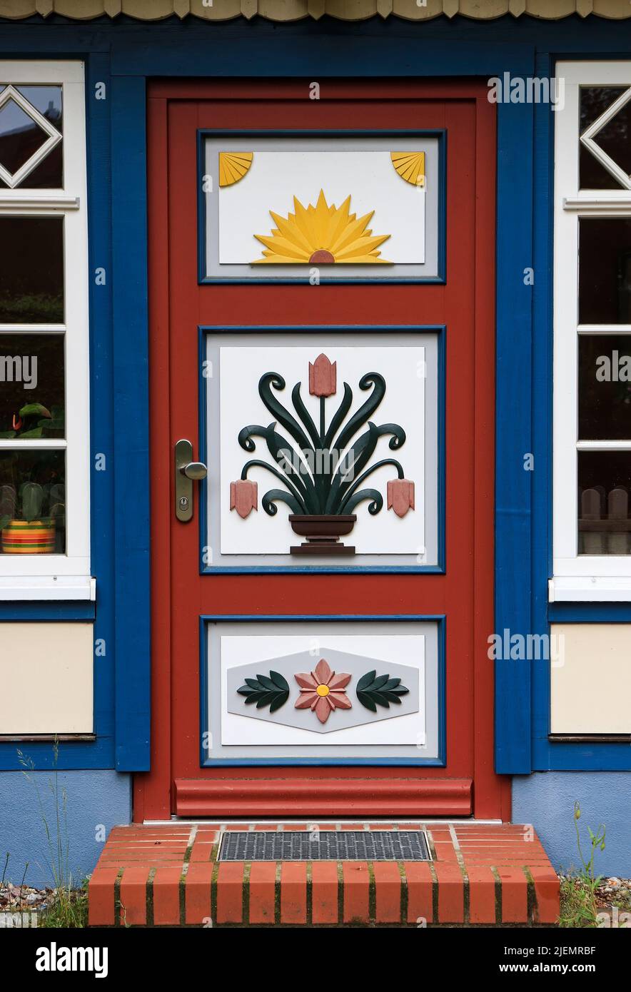 Old traditional painted door of a Fisherman's house in Northern Germany near the Baltic Sea Stock Photo