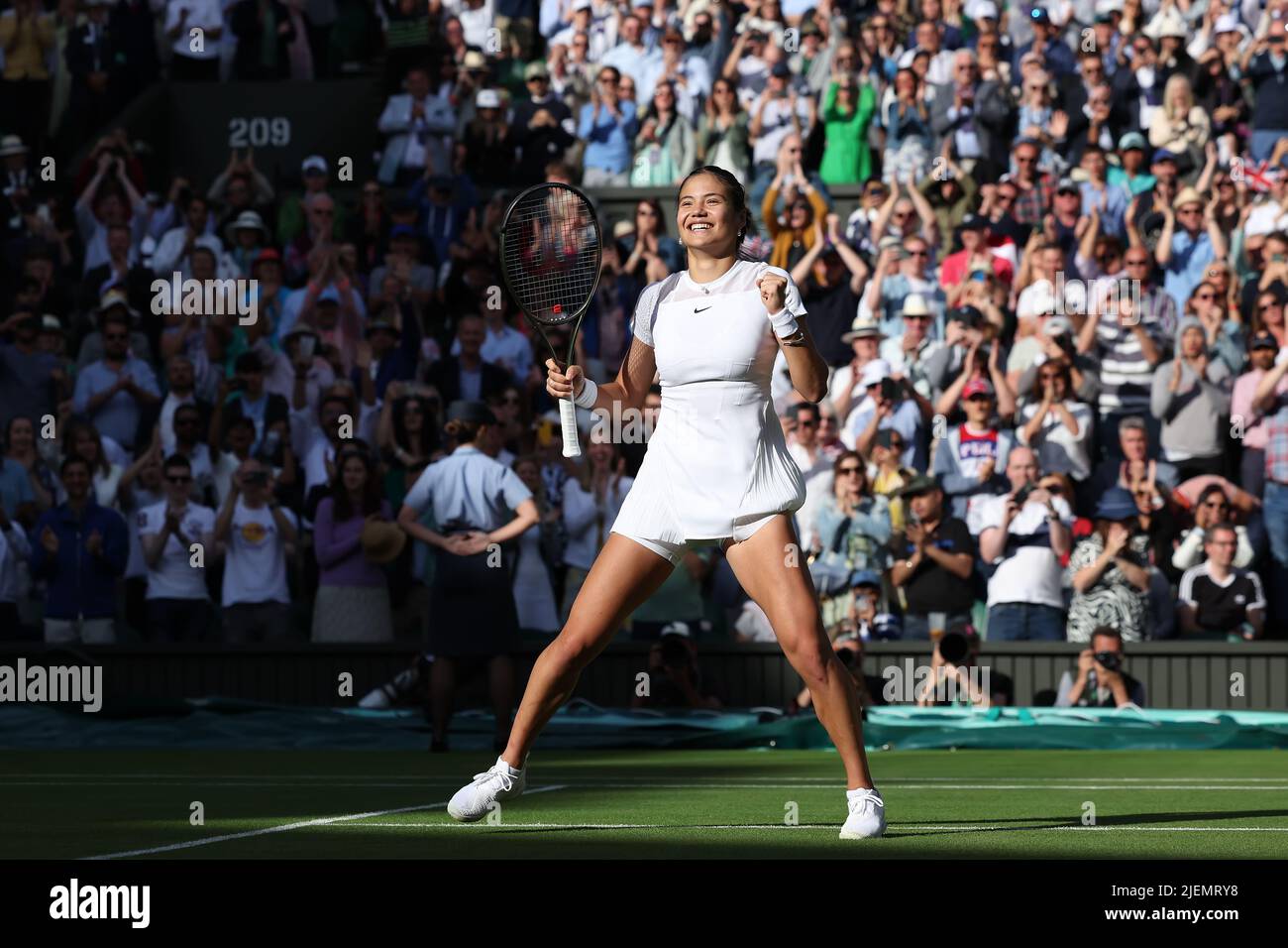Wimbledon, UK, 27th June 2022, All England Lawn Tennis and Croquet Club, London, England; Wimbledon Tennis tournament; Emma Raducanu celebrates after she wins the match 2 sets to 0 against Alison Van