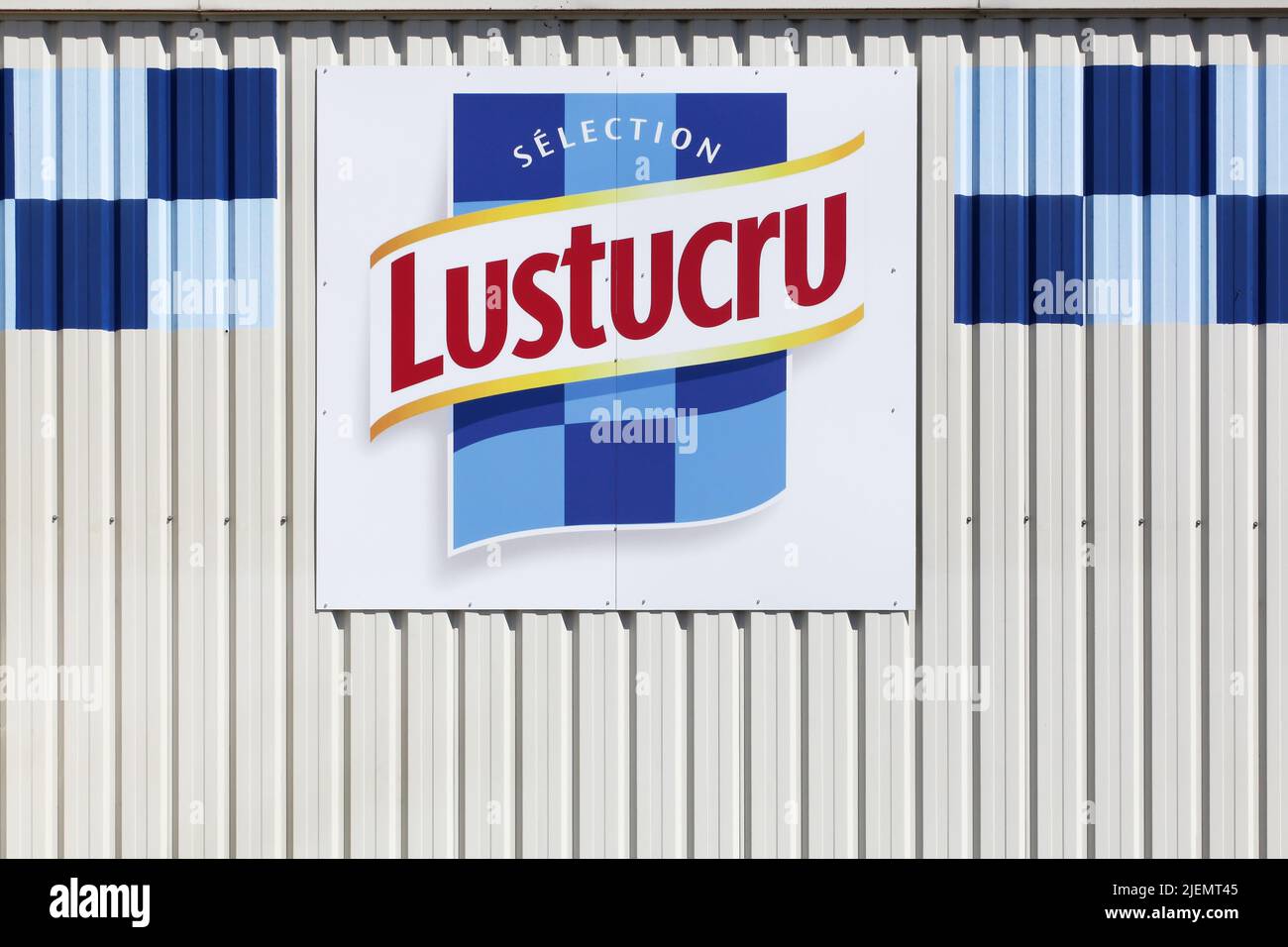 Saint Genis Laval, France - May 21, 2020: Lustucru logo on a building. Lustucru is a French brand specializing in pasta and created in 1911 Stock Photo