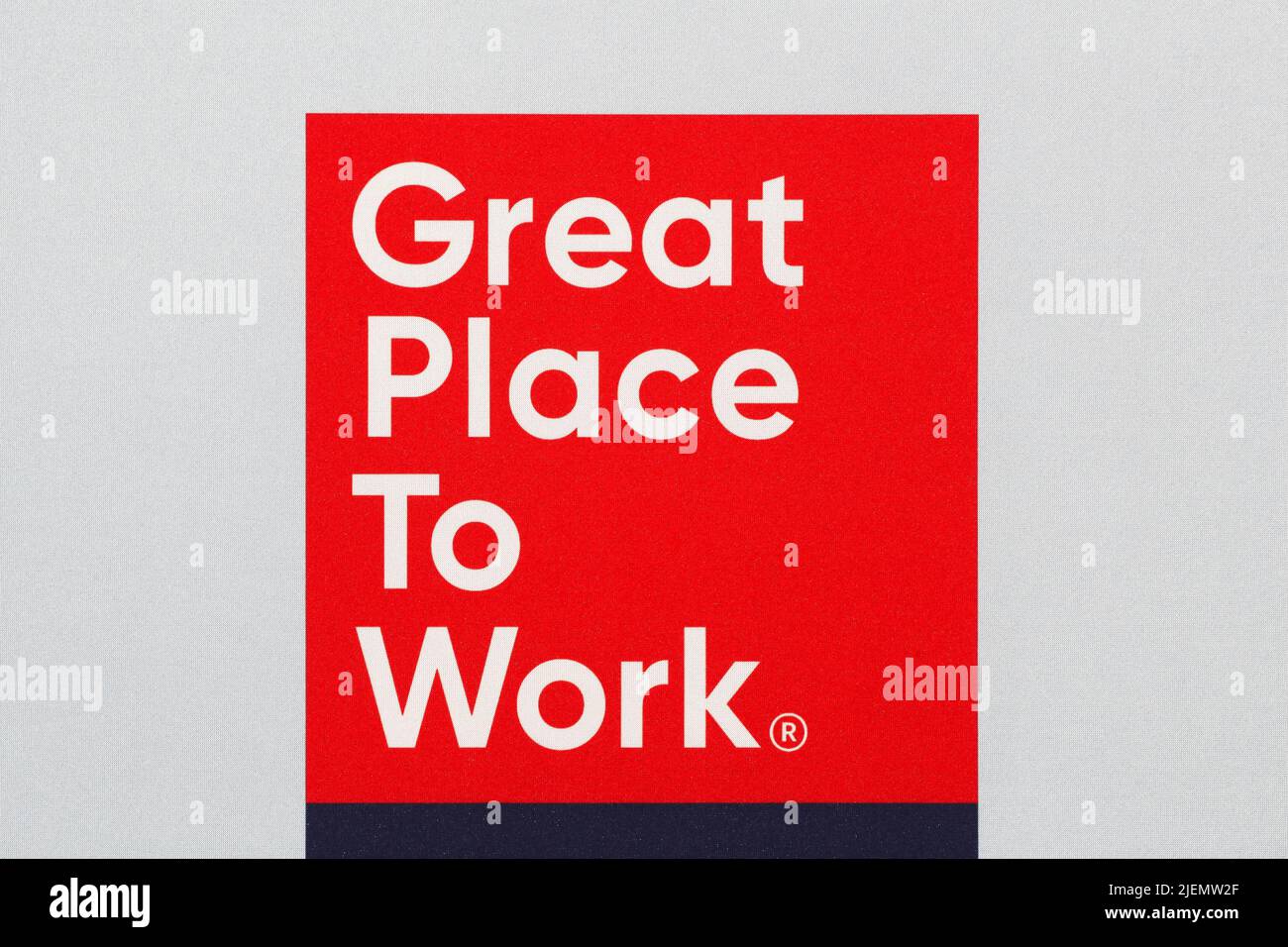 Odder, Denmark - January 14, 2022: Great place to work logo on a wall. Great place to work is the global authority on workplace culture Stock Photo