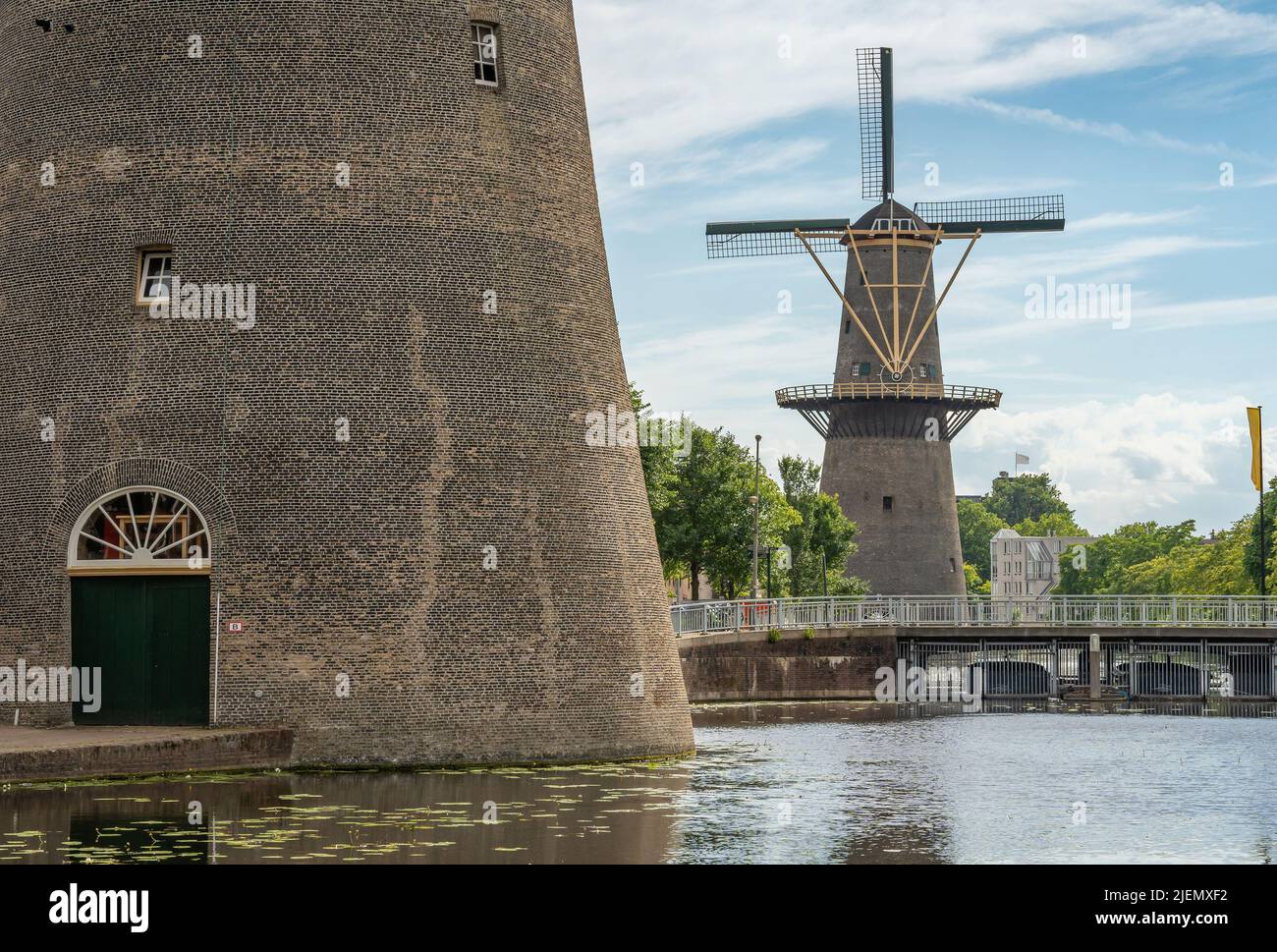 Famous historical dutch windmills in the city of Schiedam, which are known to be the tallest in the world Stock Photo