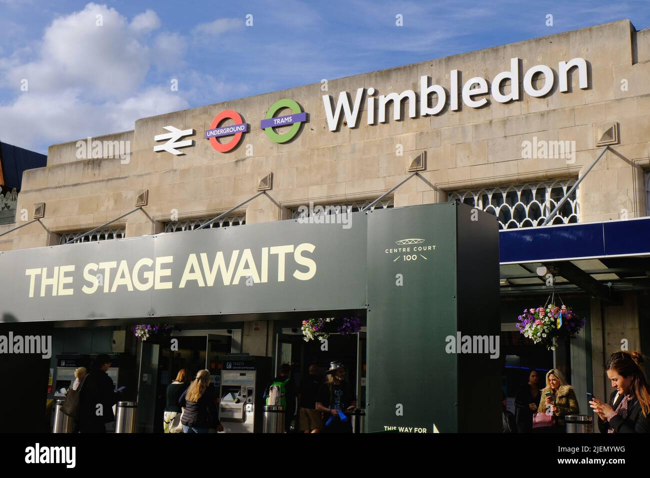 London, UK, 27th June, 2022. Wimbledon Station facade on the first day of the 2022 tennis tournament. Shuttle buses operate to the ground from the station. Credit: Eleventh Hour Photography/Alamy Live News Stock Photo