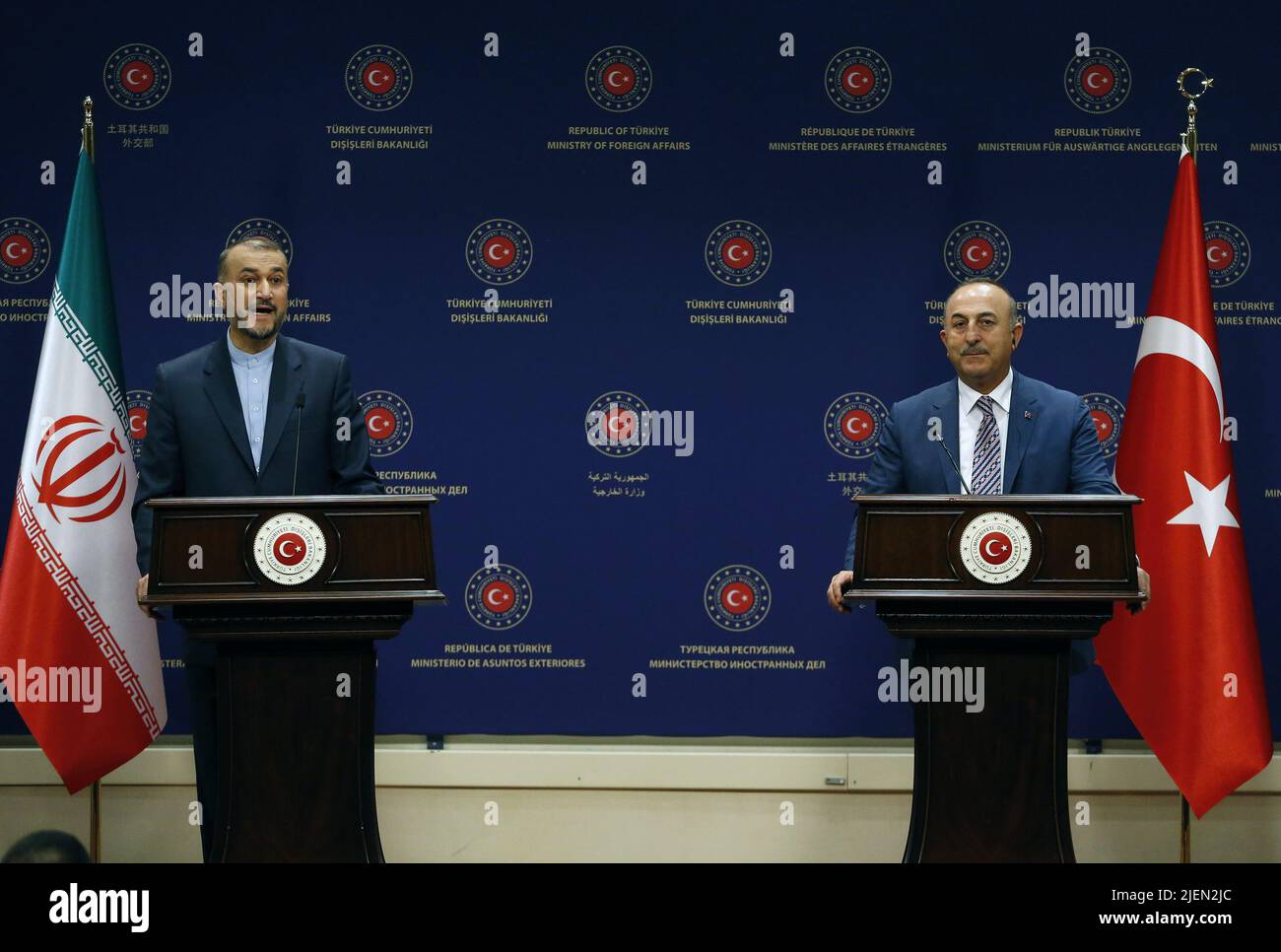 Ankara, Turkey. 27th June, 2022. Turkish Foreign Minister Mevlut Cavusoglu (R) and Iranian Foreign Minister Hossein Amir-Abdollahian attend a joint press conference in Ankara, Turkey, on June 27, 2022. Turkey is against the unilateral sanctions on Iran, Turkish Foreign Minister Mevlut Cavusoglu said on Monday, voicing hopes for the nuclear deal to be restored. Credit: Mustafa Kaya/Xinhua/Alamy Live News Stock Photo