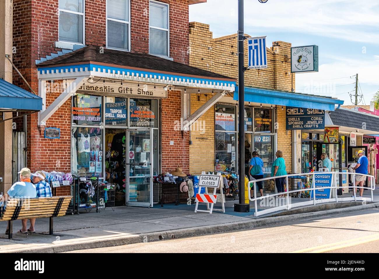 Tarpon Springs, USA - October 4, 2021: Florida Greek town fishing village Dodecanese boulevard street blue buildings and Costas Gianeskis Sponge Store Stock Photo