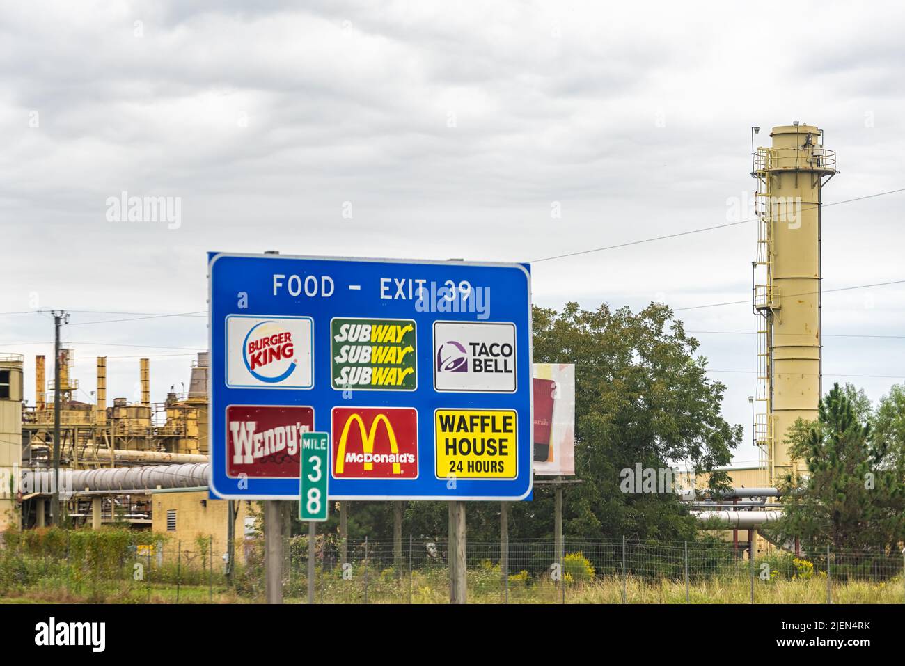 Adel, USA - October 5, 2021: View of interstate i-75 sign for fast food restaurants in Georgia with Burger King and McDonalds and background of Sunbel Stock Photo