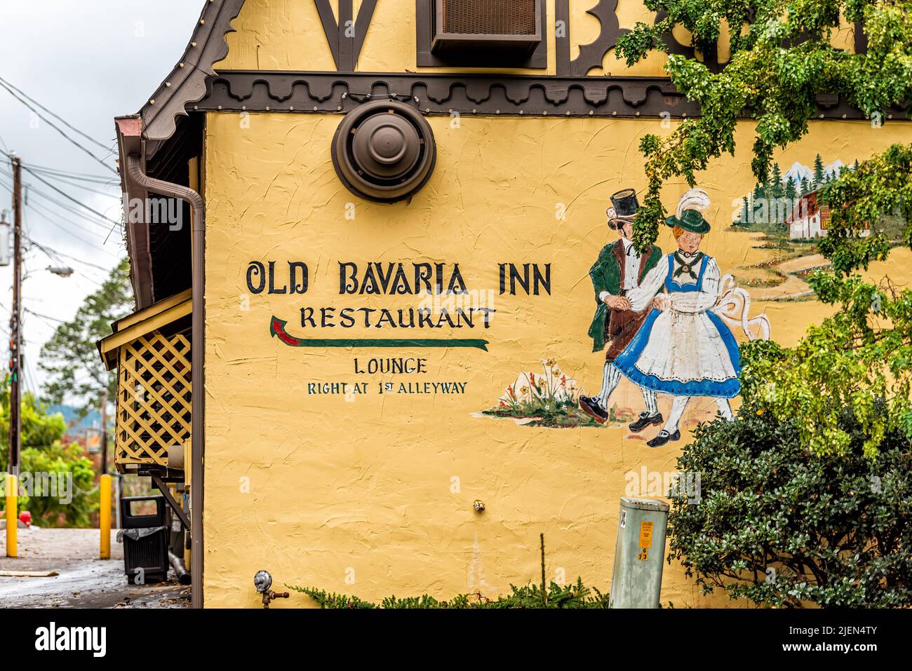 Helen, USA - October 5, 2021: Bavarian village of Helen, Georgia traditional architecture colorful building house sign for Old Bavaria Inn restaurant Stock Photo