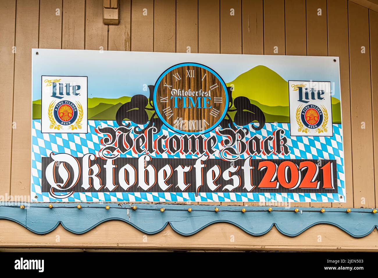 Helen, USA - October 5, 2021: Helen, Georgia Bavarian village sign for welcome back to Oktoberfest festival 2021 with Miller Lite sponsor for Alpine P Stock Photo