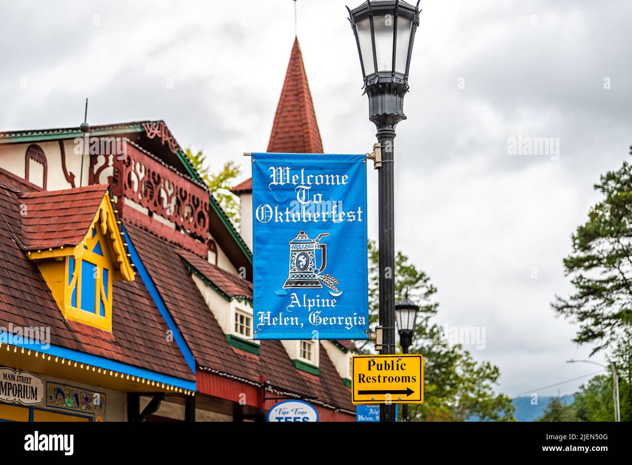 Helen, USA - October 5, 2021: Bavarian village of Helen, Georgia with welcome sign for famous Oktoberfest festival in fall season with tower architect Stock Photo