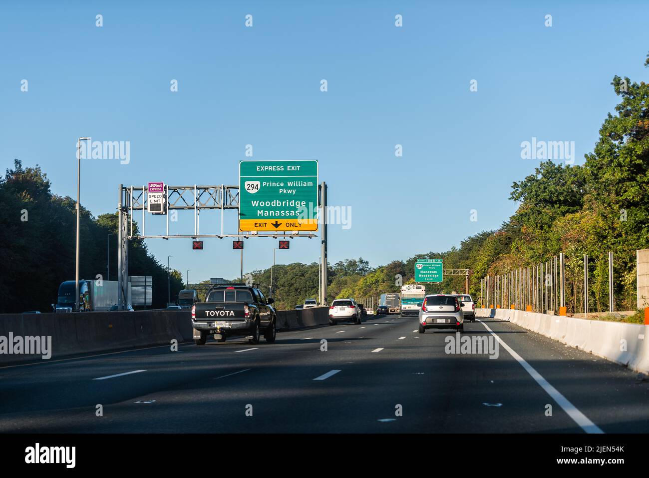 Woodbridge, USA - October 18, 2021: Highway i-95 interstate road in Virginia with cars on commute in morning traffic near Washington DC and sign for P Stock Photo