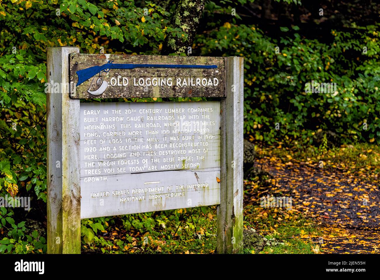Raphine, USA - October 7, 2021: Blue Ridge Mountains with sign on parkway overlook for Old Logging Railroad history information in autumn fall season Stock Photo