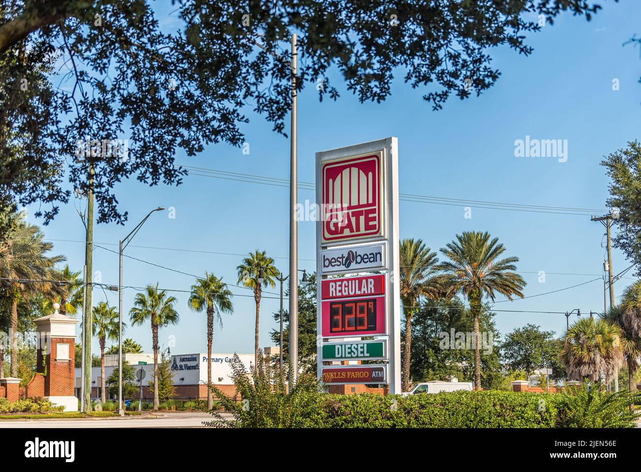 Jacksonville, USA - October 19, 2021: Sign for Gate local gas station and Best Bean coffee with diesel price and Wells Fargo ATM in north Florida down Stock Photo