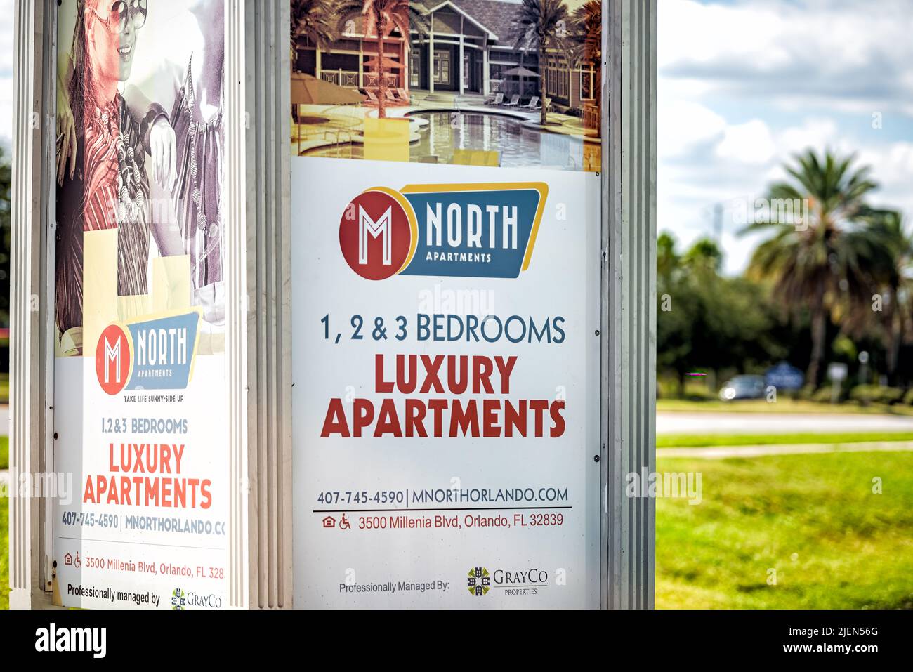 Orlando, USA - October 19, 2021: Billboard bus stop advertisement for luxury 1 2 and 3 bedroom apartments in north Orlando, Florida city Stock Photo