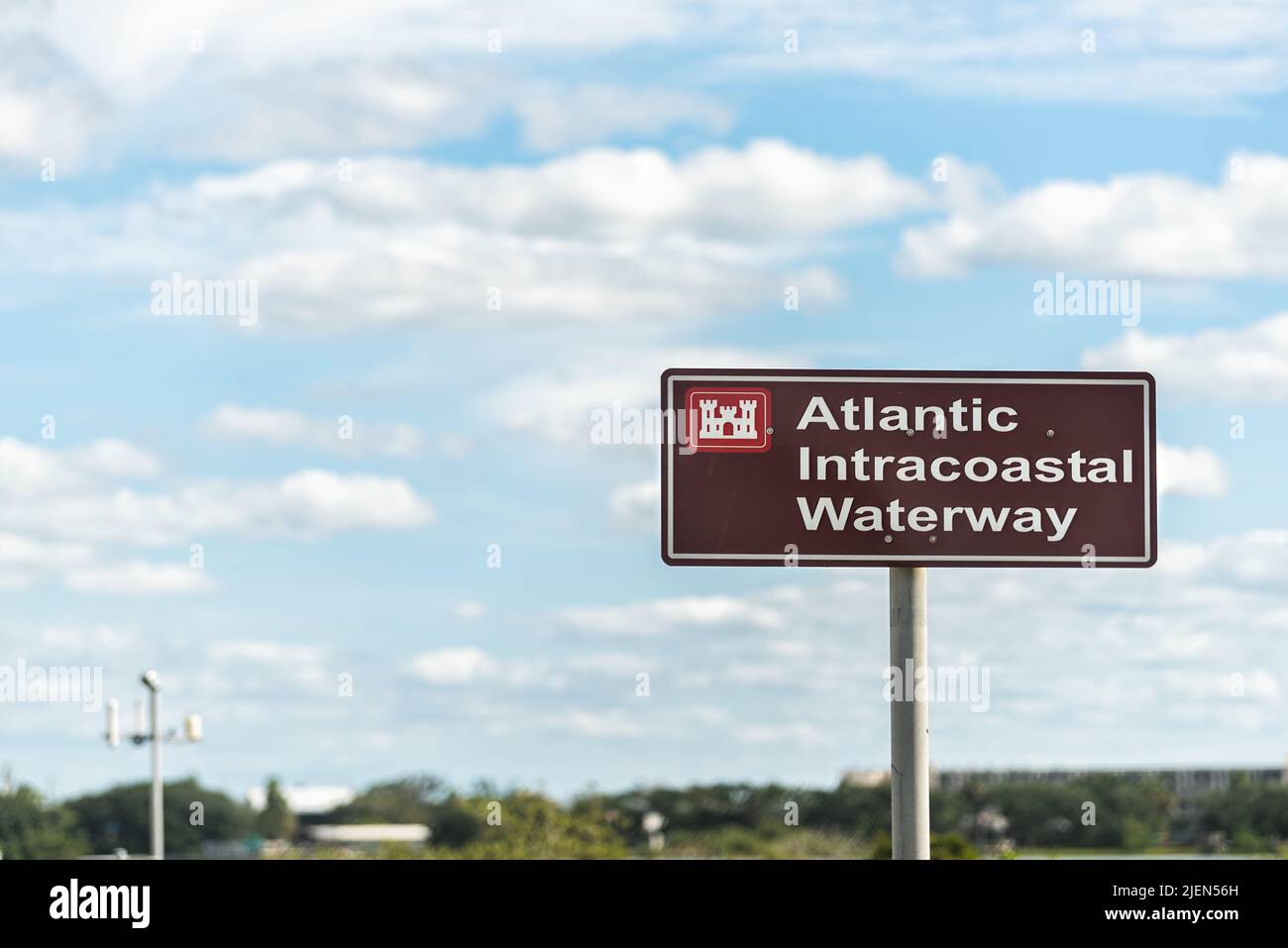 Crescent Beach, Florida with Atlantic Intracoastal Waterway sign that extends more Norfolk, VA to Key West, FL on sunny day with clouds in blue sky Stock Photo