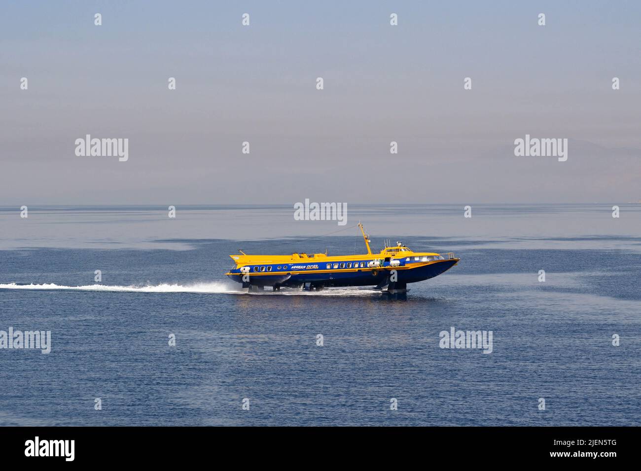 Piraeus, Athens, Greece - June 2022: High speed hydrofoil ferry approaching the port of Piraeus Stock Photo