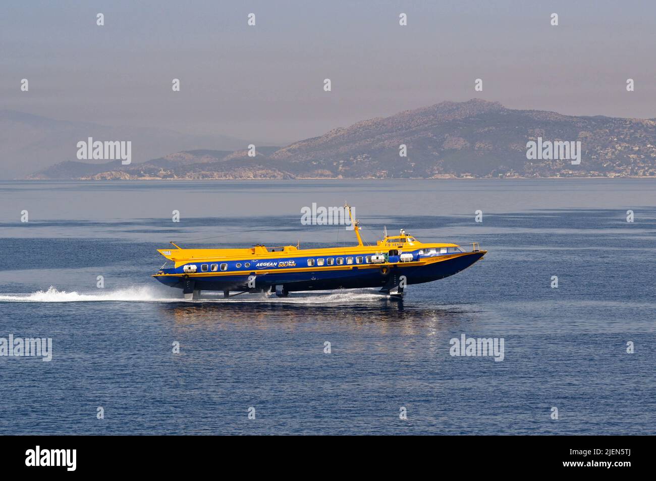 Piraeus, Athens, Greece - June 2022: High speed hydrofoil ferry approaching the port of Piraeus Stock Photo