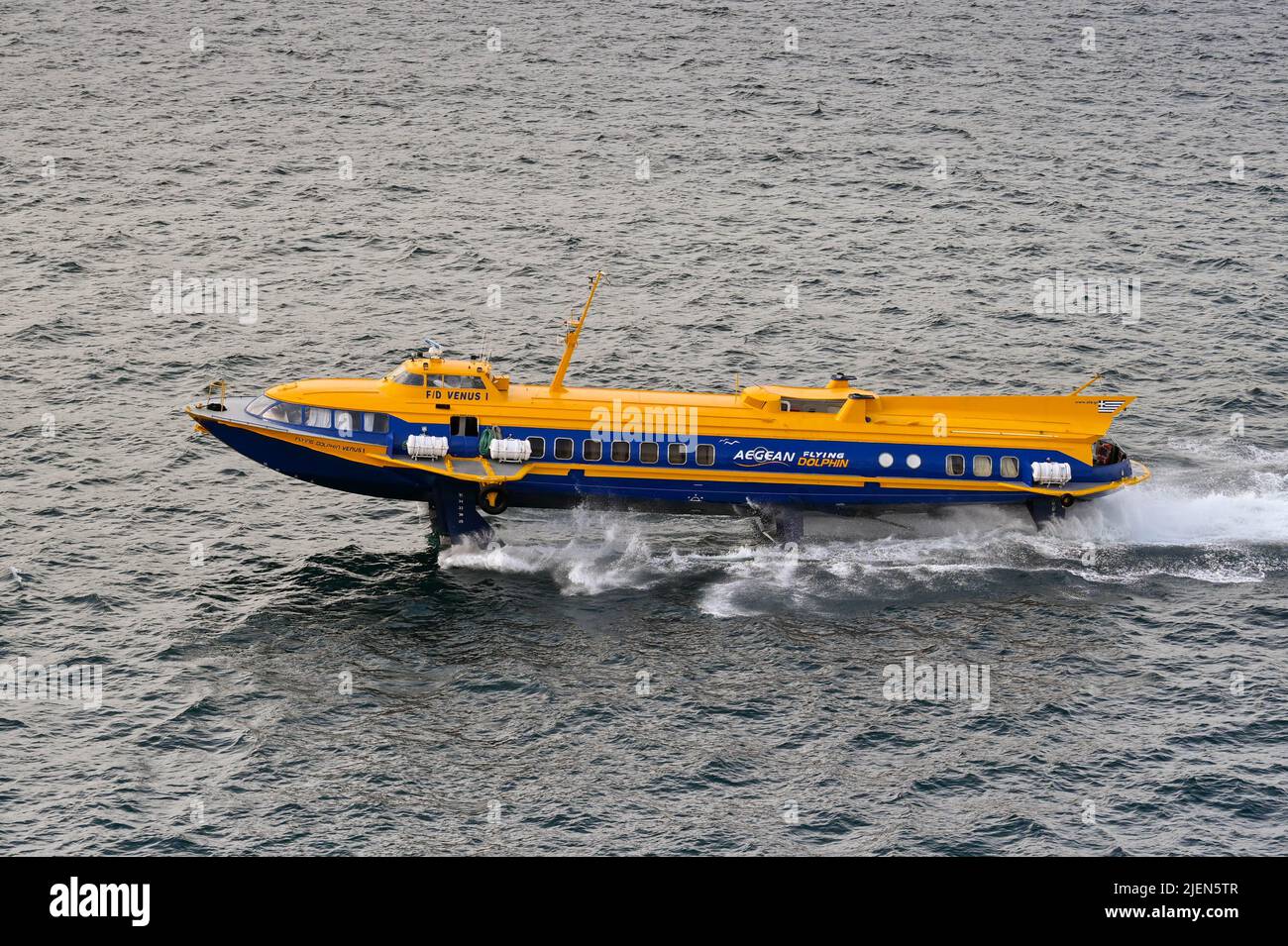 Piraeus, Athens, Greece - June 2022: High speed hydrofoil ferry after leaving the port of Piraeus Stock Photo