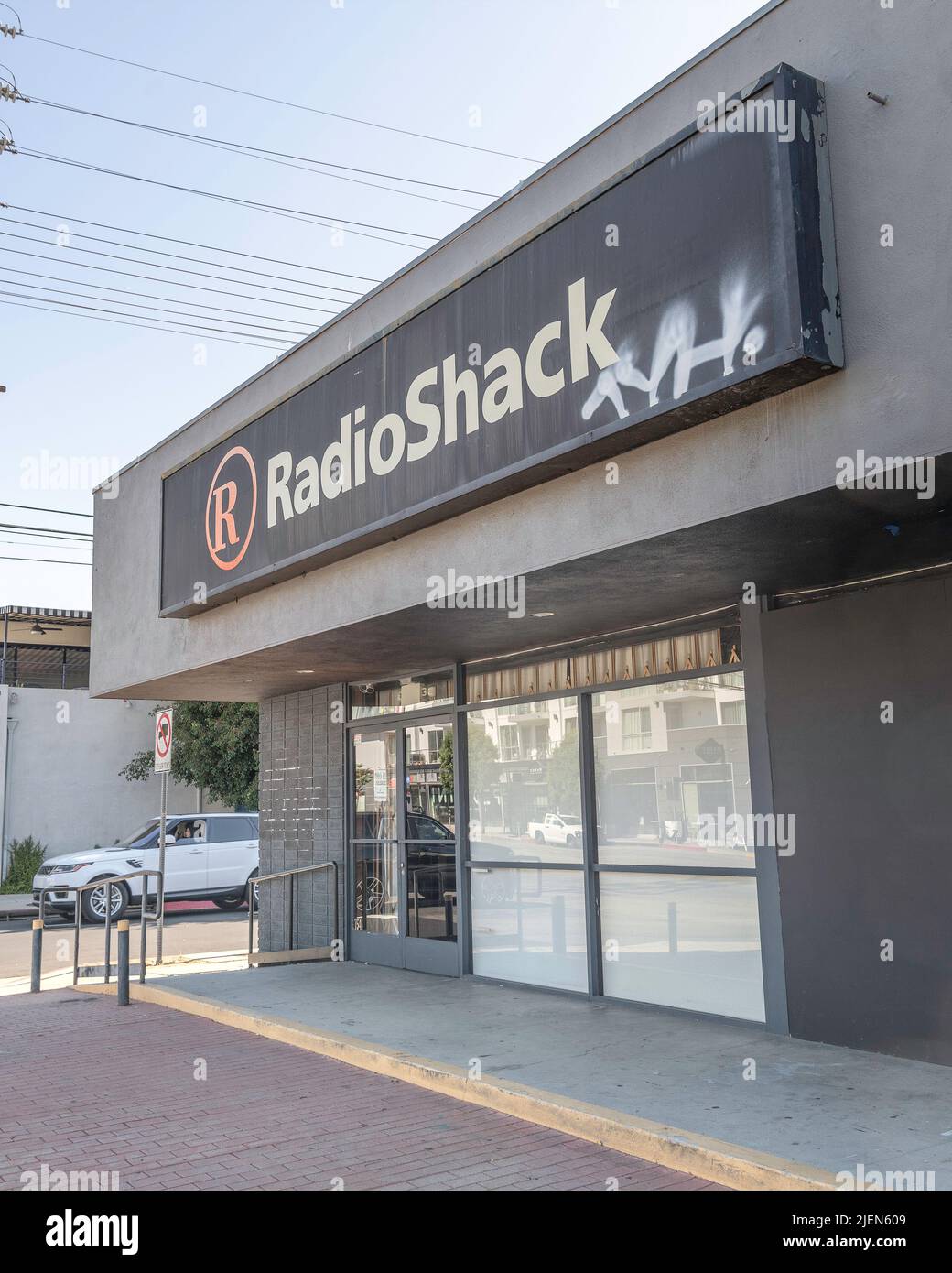 Los Angeles, CA, USA – June 27, 2022: Exterior of an abandoned RadioShack electronics store after the company went bankrupt, Los Angeles, CA. Stock Photo