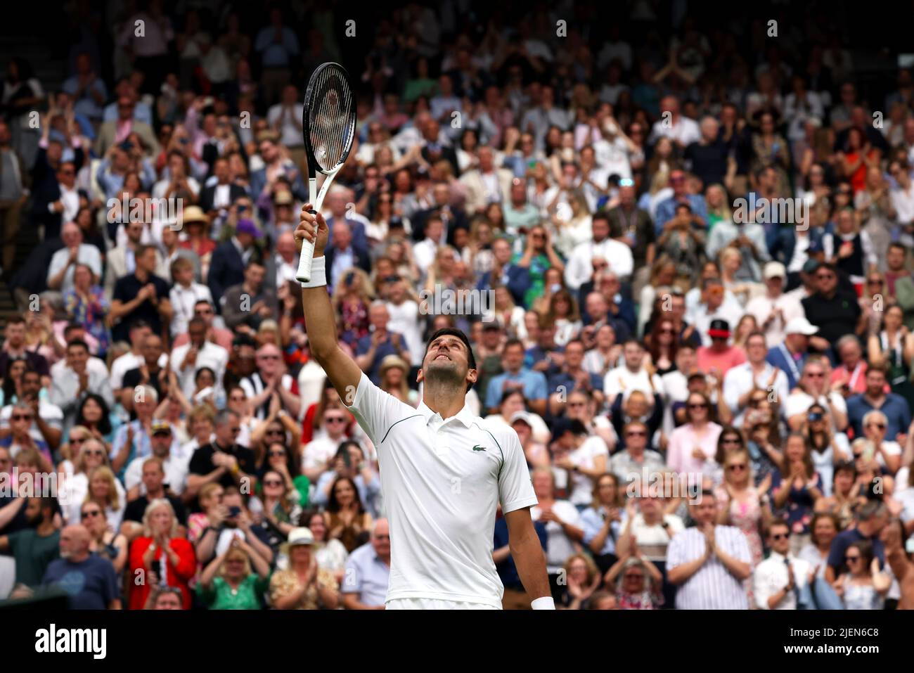 London, 27 June 2022 - Number one seed Novak Acknowledges the crowd following his opening round victory against Soon Woo Koon on Centre Court at Wimbledon. Credit: Adam Stoltman/Alamy Live News Stock Photo