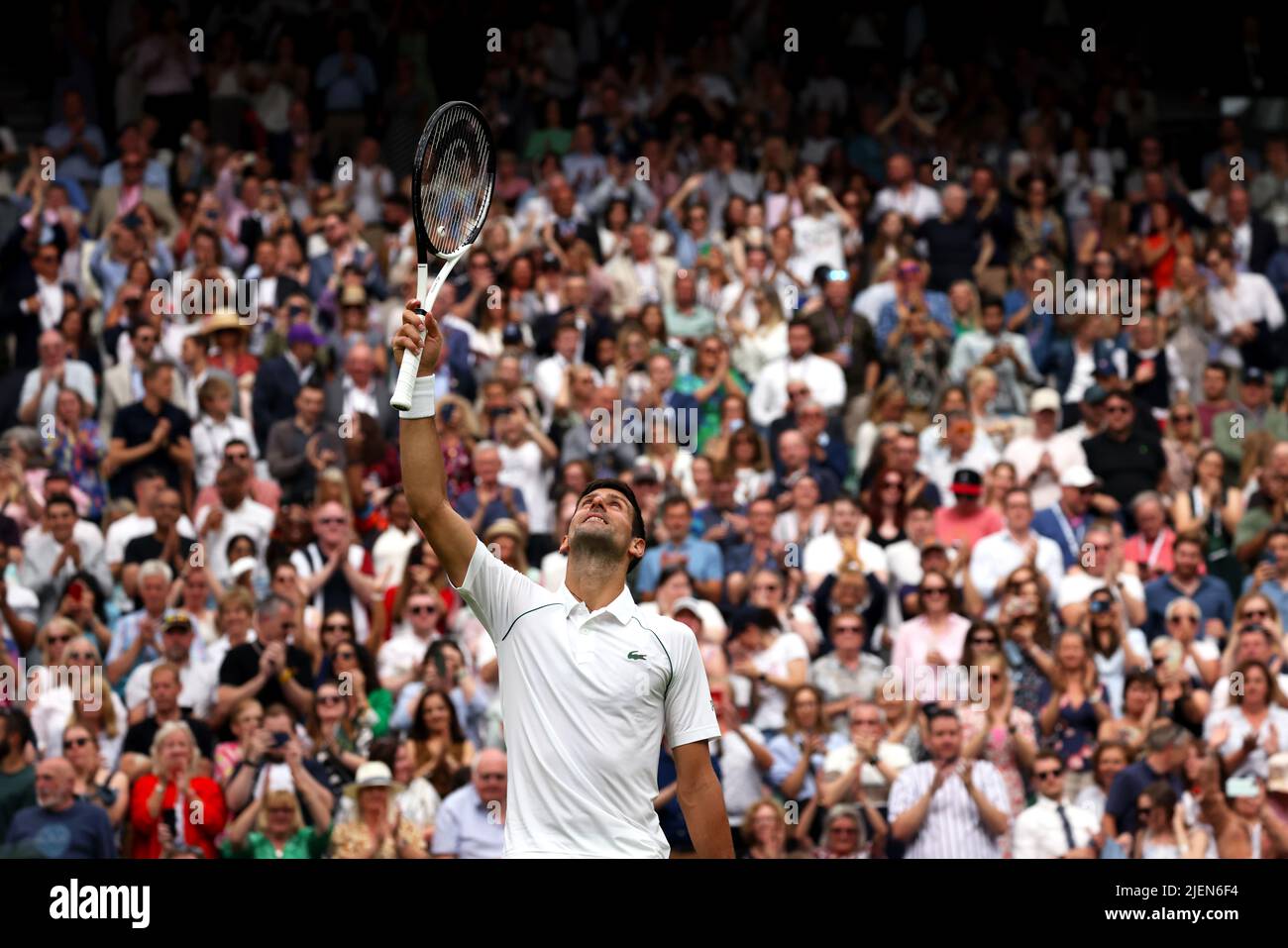London, 27 June 2022 - Number one seed Novak Acknowledges the crowd following his opening round victory against Soon Woo Koon on Centre Court at Wimbledon. Credit: Adam Stoltman/Alamy Live News Stock Photo