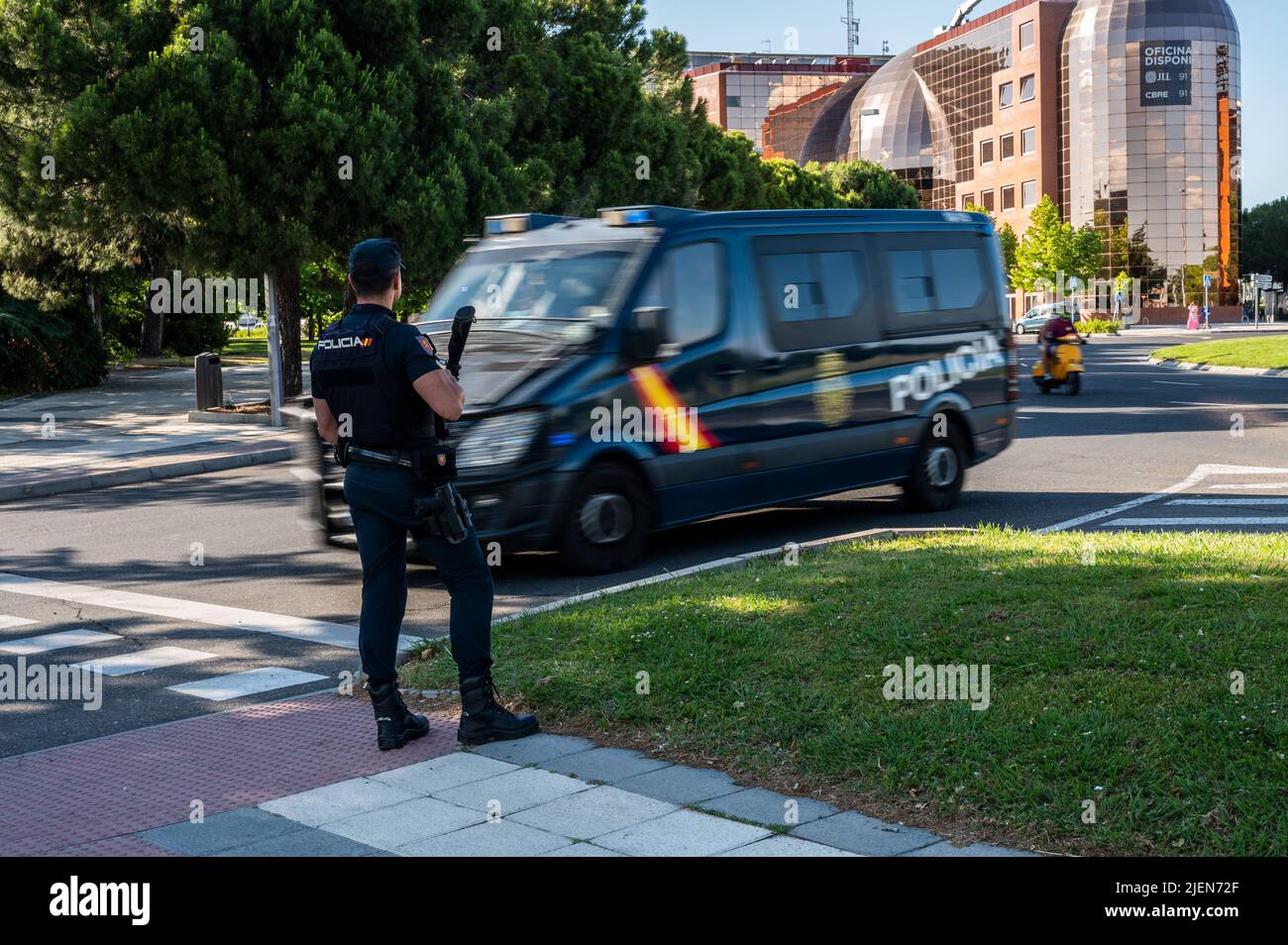 Madrid, Spain. 27th June, 2022. Police officers patrol near IFEMA where the NATO Summit will take place. Spain will host a NATO Summit in Madrid on 29th and 30th of June 2022. Credit: Marcos del Mazo/Alamy Live News Stock Photo