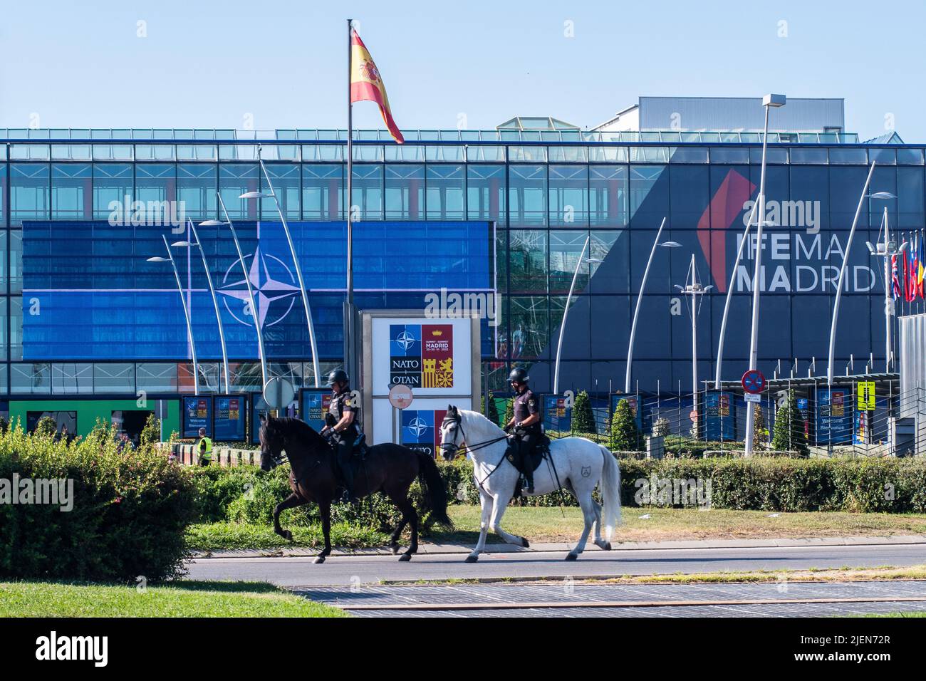 Madrid, Spain. 27th June, 2022. Mounted police officers patrol in IFEMA where the NATO Summit will take place. Spain will host a NATO Summit in Madrid on 29th and 30th of June 2022. Credit: Marcos del Mazo/Alamy Live News Stock Photo