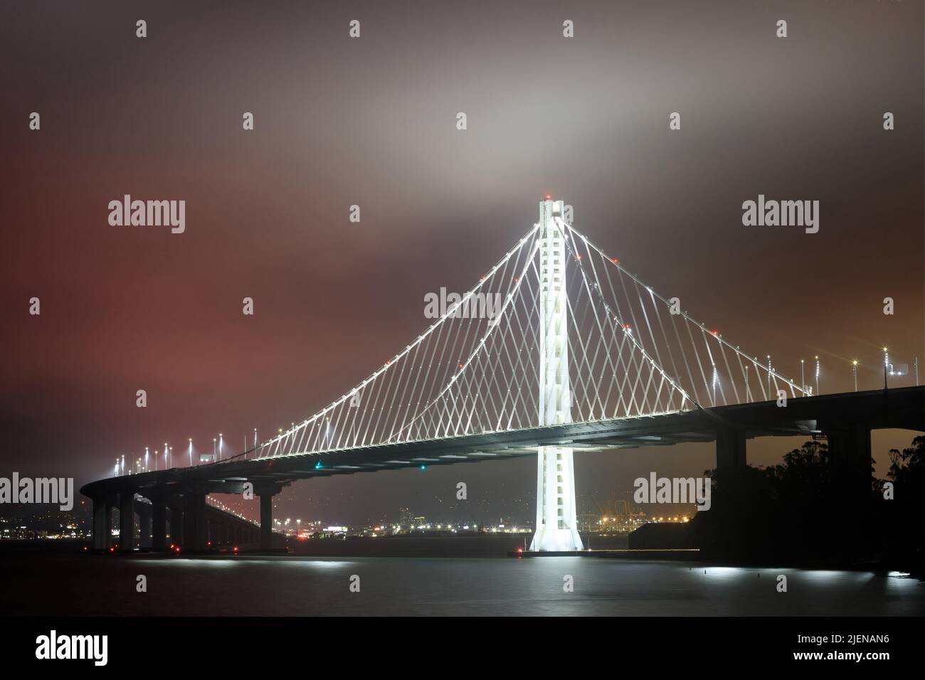 San Francisco-Oakland Bay Bridge Eastern Span in the Fog via Treasure Island. Stock Photo