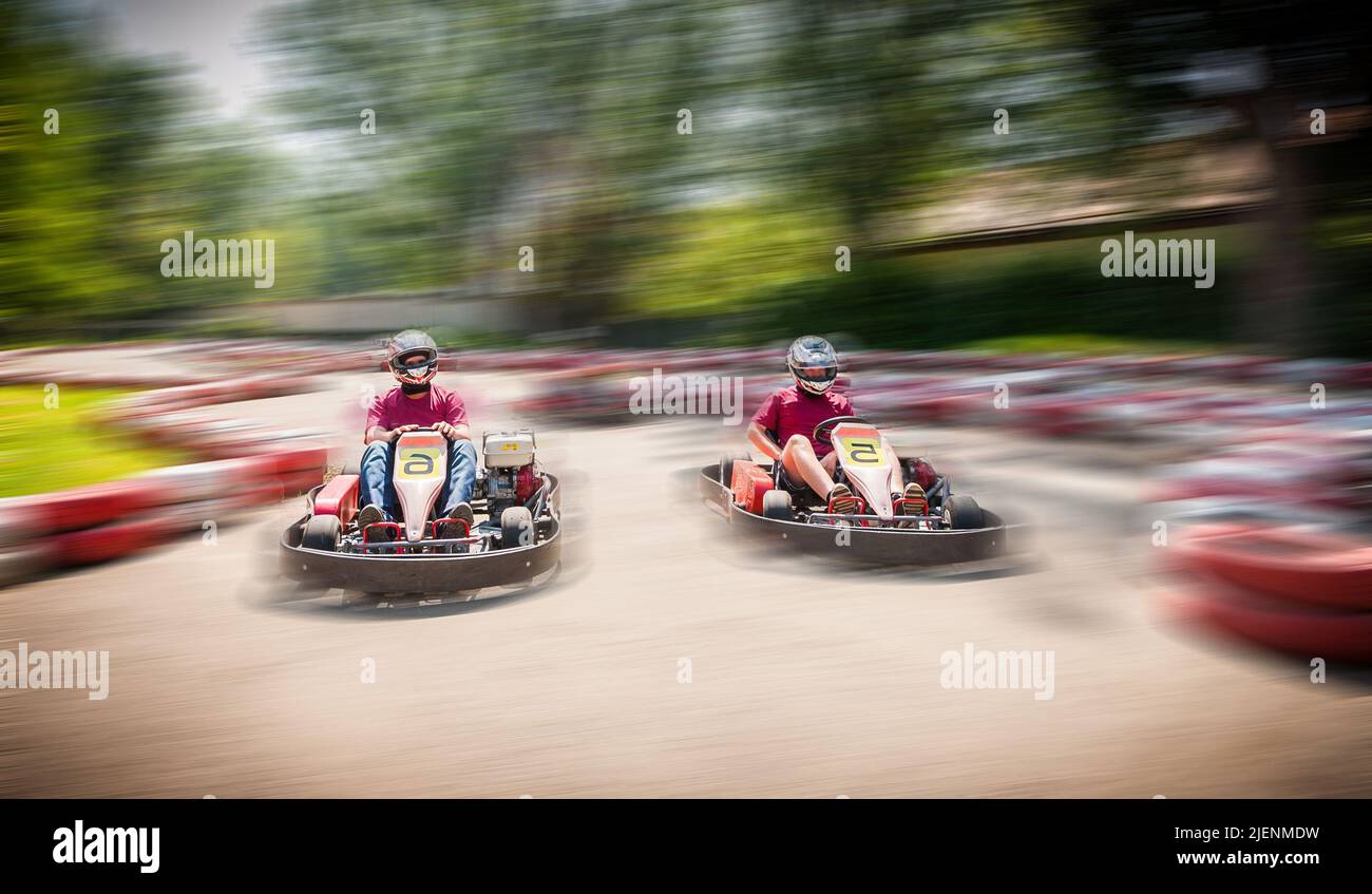 Go kart speed drive race sport contest with motion blur effect Stock