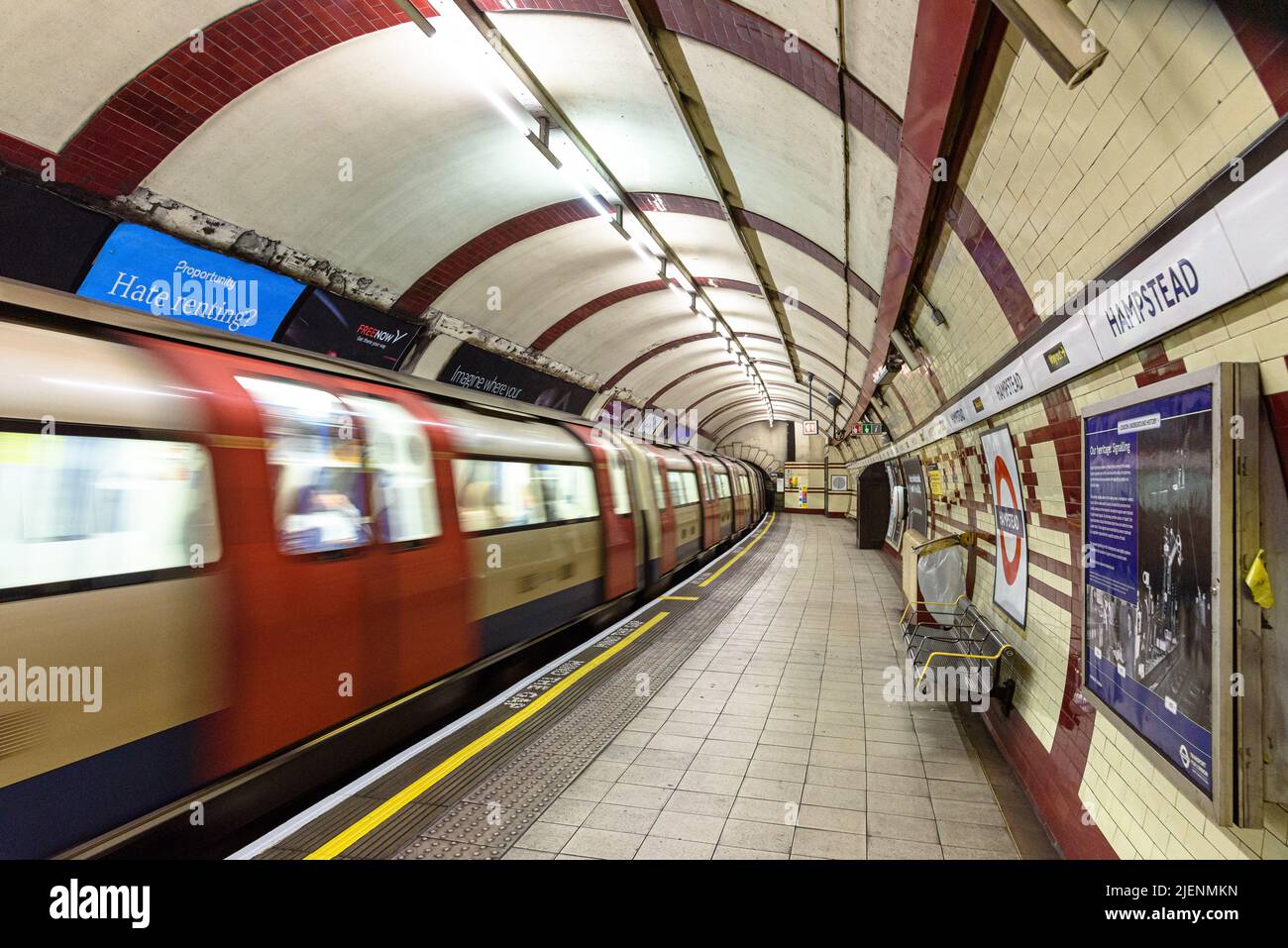 A Northern Line train leaving Hampstead Tube Station Stock Photo