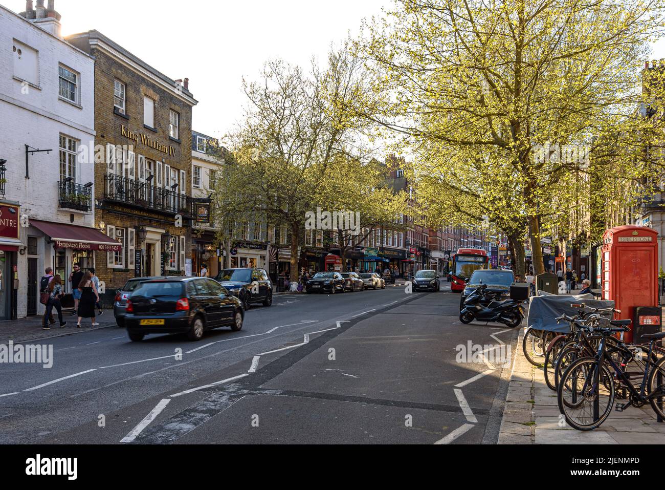 Hampstead High Street on a spring afternoon, teeming with people Stock Photo