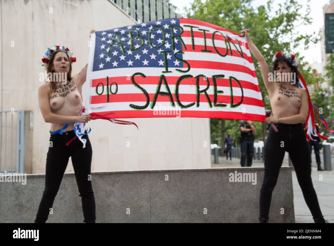 Madrid, Spain. 27th June, 2022. (EDITORS NOTE: Image contains nudity) FEMEN  activists protest in favor of abortion at the US embassy in Madrid. (Photo  by Fer Capdepon Arroyo/Pacific Press) Credit: Pacific Press