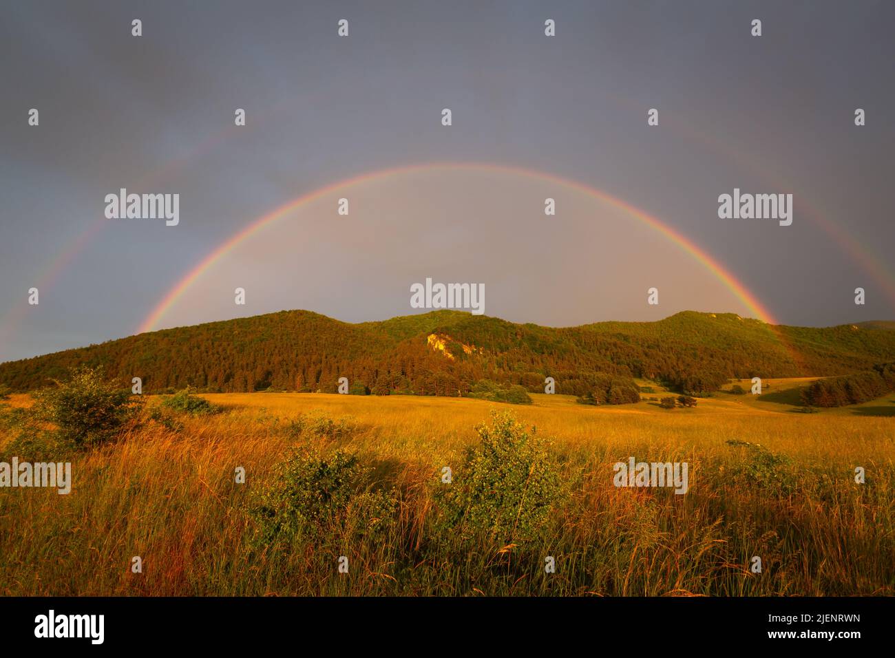 Rainbow over Velka Fatra mountains in Turiec region, Slovakia. Stock Photo