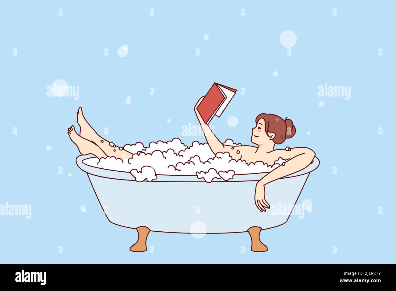 Happy young woman relaxing in bathtub with foam reading book. Calm girl