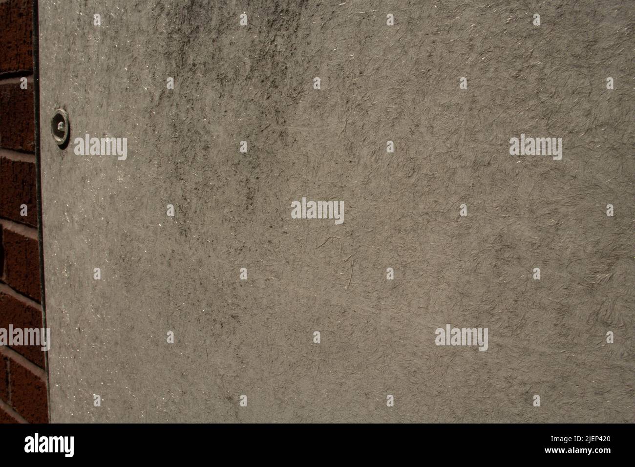 detail of a gas meter box cover and lock with mould and grime Stock