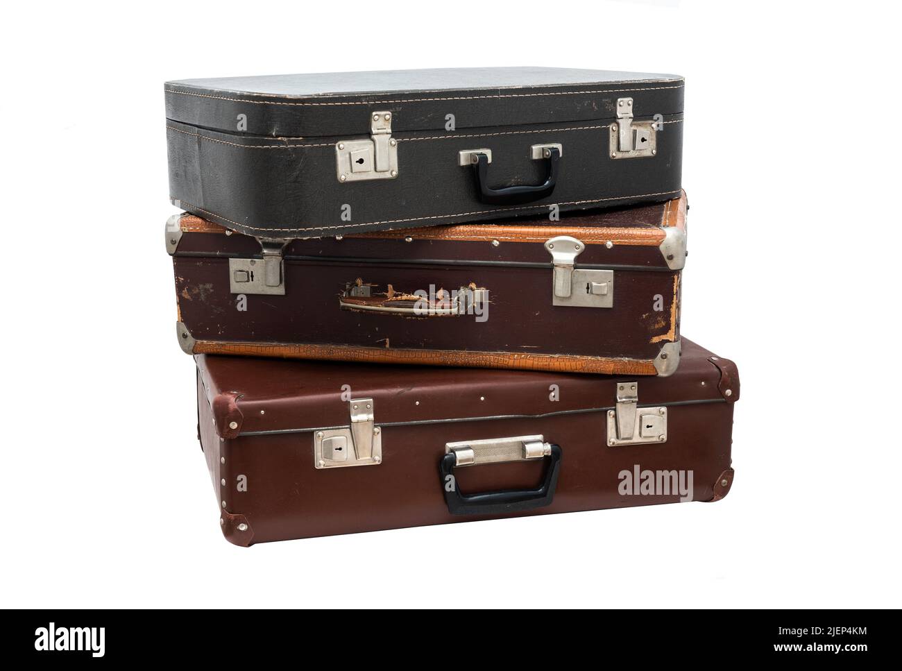 Stack of old leather vintage suitcases isolated on white Stock Photo