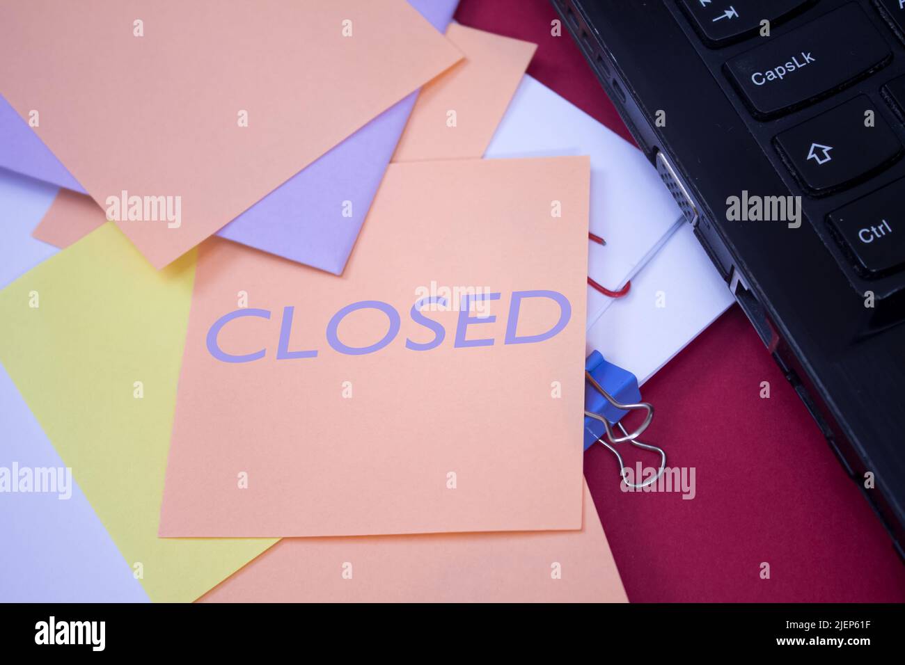 Closed. Text on adhesive note paper. Event, celebration reminder message. Stock Photo