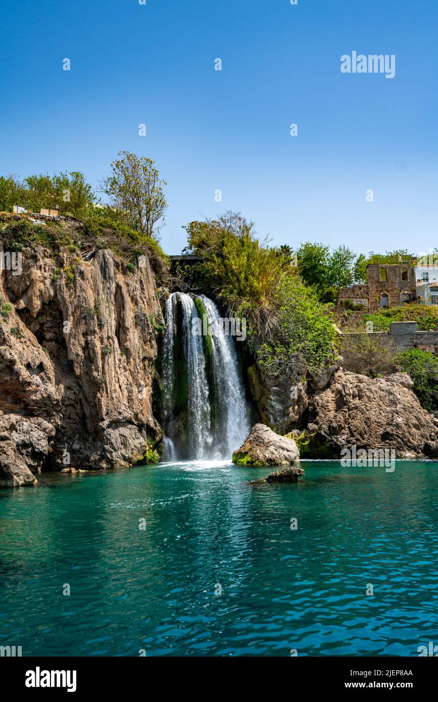 Lower Düden Falls drop off a rocky cliff directly into the Mediterranean Sea Stock Photo
