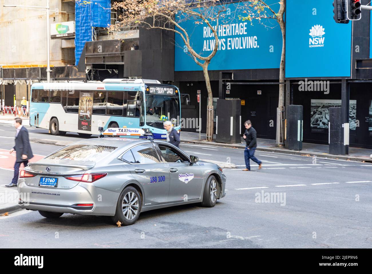 Australian taxi vehicle and public transport single decker bus in ...
