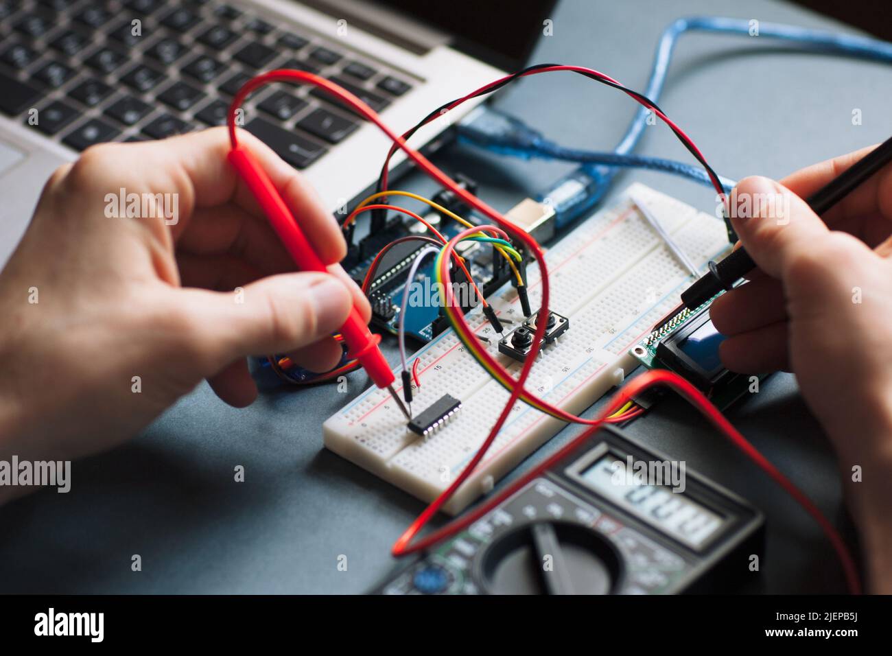 Inventor testing new device close-up Stock Photo